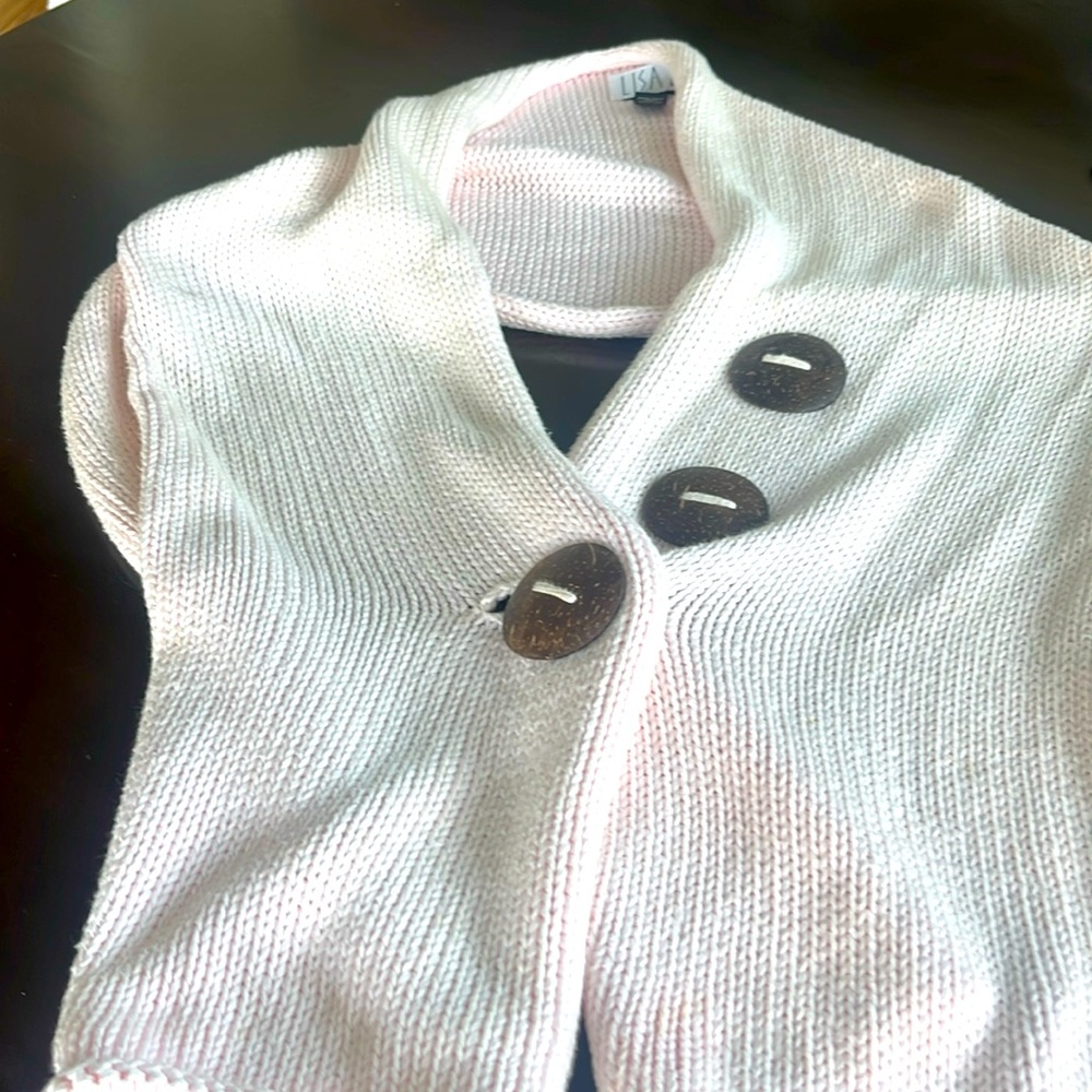 Hand knit button shawl